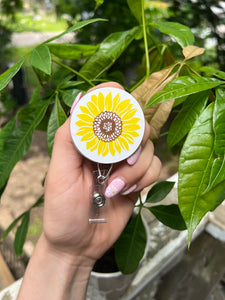 Sunflower badge reel